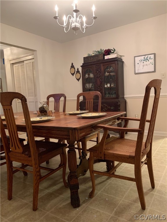 67 Mahan Road Farmville, VA 23901 - Photo 14 of 49 a view of a dining room with furniture and chandelier