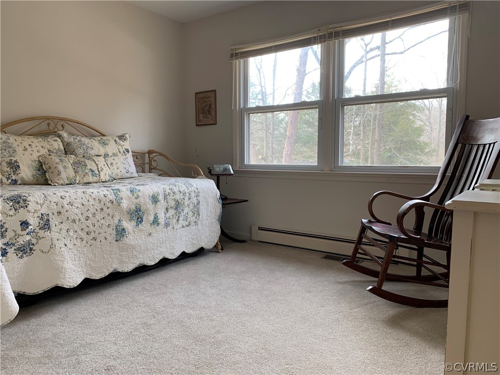 67 Mahan Road Farmville, VA 23901 - Photo 28 of 49 a bedroom with a bed dresser and a window
