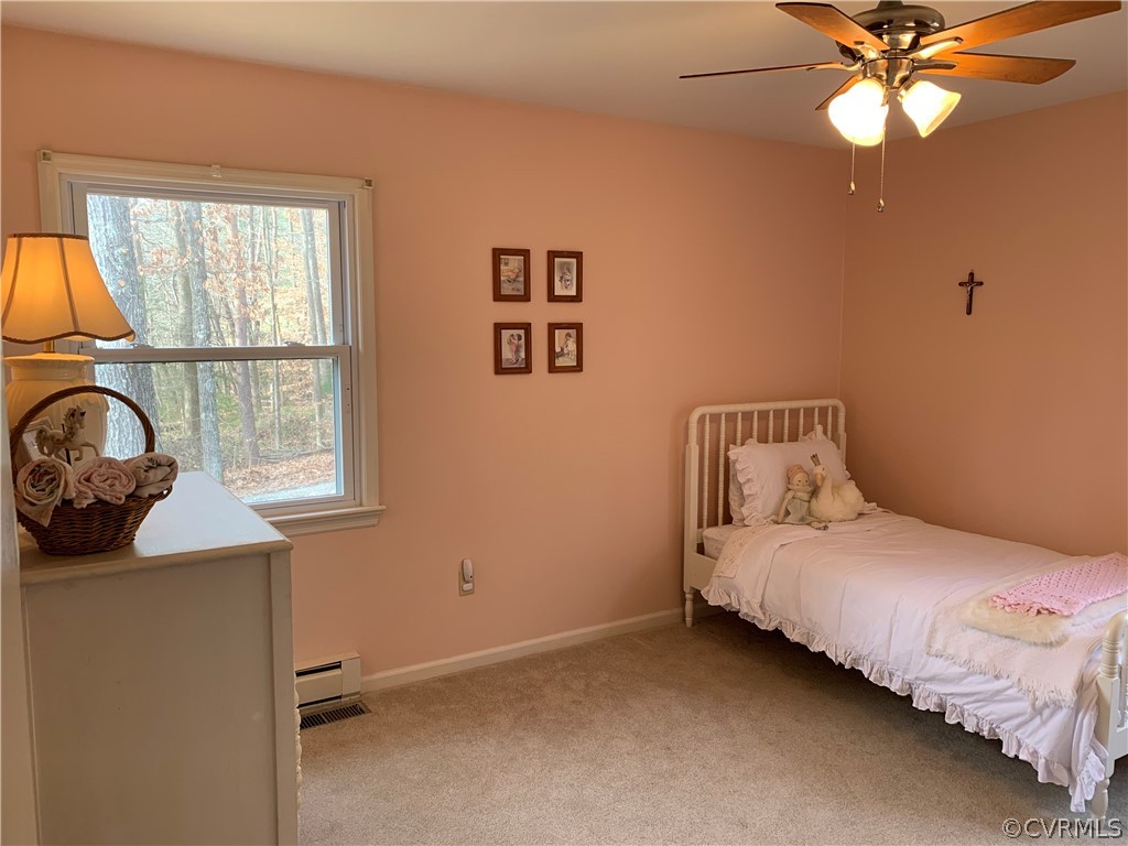 67 Mahan Road Farmville, VA 23901 - Photo 34 of 49 a bedroom with a bed and a window