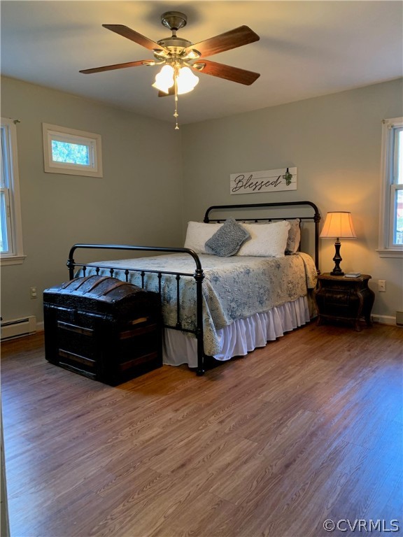 67 Mahan Road Farmville, VA 23901 - Photo 44 of 49 a bedroom with bed and a chandelier