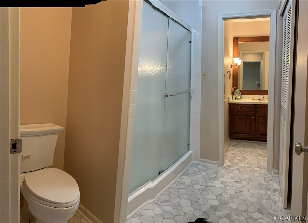 67 Mahan Road Farmville, VA 23901 - Photo 45 of 49 a bathroom with a granite countertop toilet and a sink