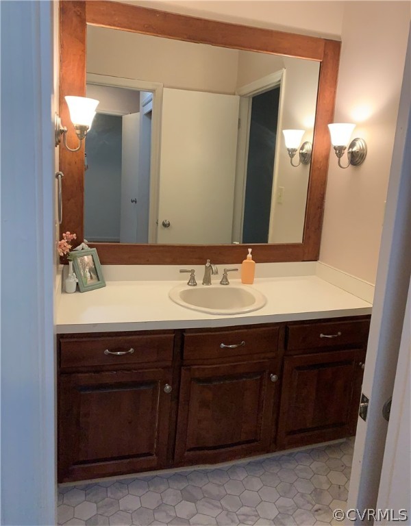 67 Mahan Road Farmville, VA 23901 - Photo 46 of 49 a bathroom with a sink and a mirror