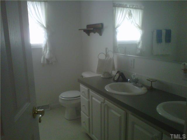 26 Chic Ennis Road Coats, NC 27521 - Photo 4 of 6 Master Bathroom has His and Her vanities....