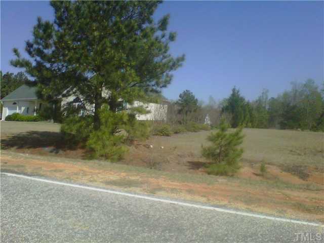 26 Chic Ennis Road Coats, NC 27521 - Photo 5 of 6 The corner lot adjacent to right side of home may still be available for a homesite.