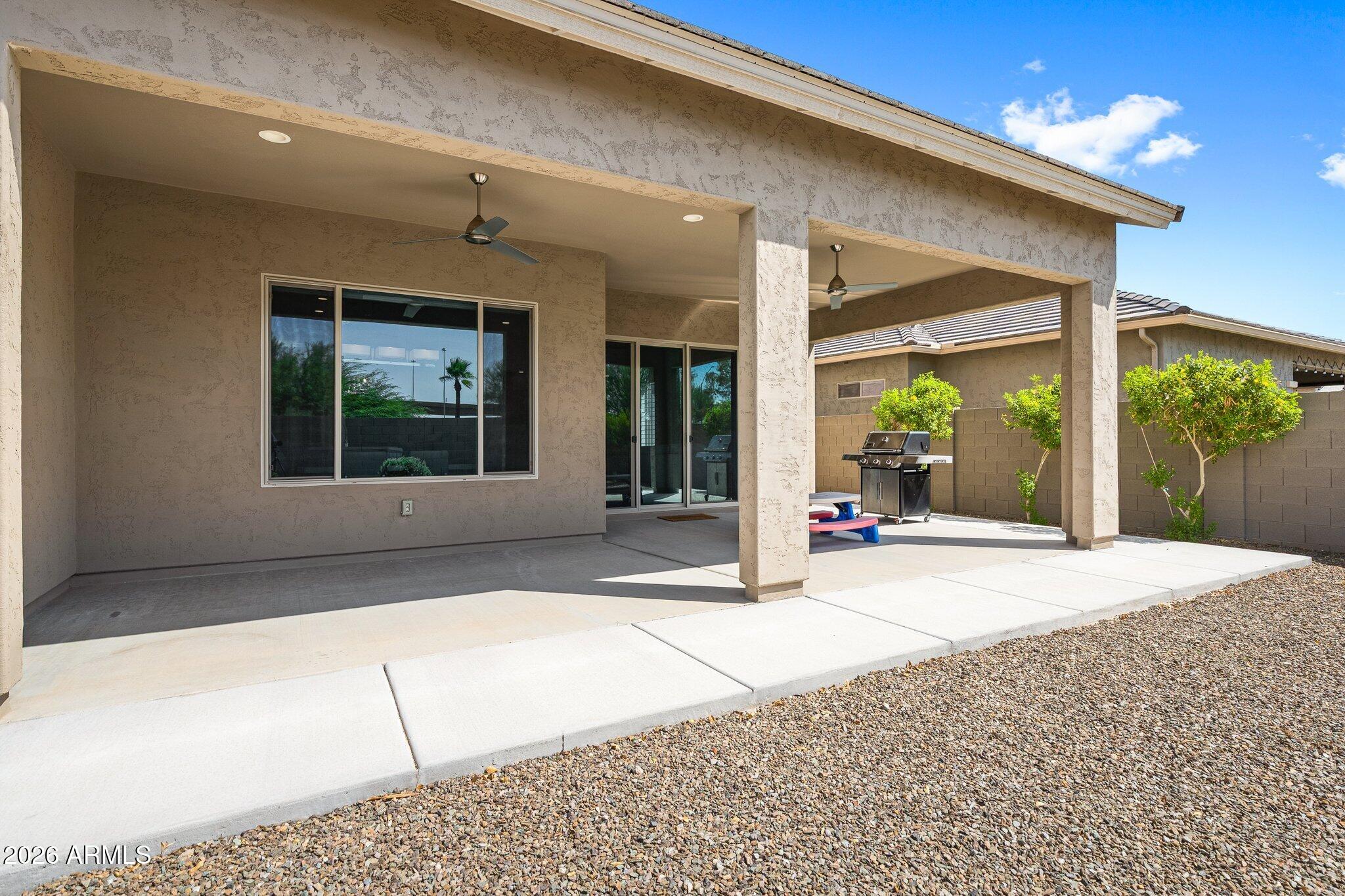 16897 West Almeria Road Goodyear, AZ 85395 - Photo 40 of 51 Expansive Covered Patio