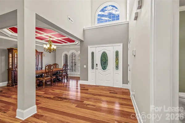 a view of dining room with wooden floor