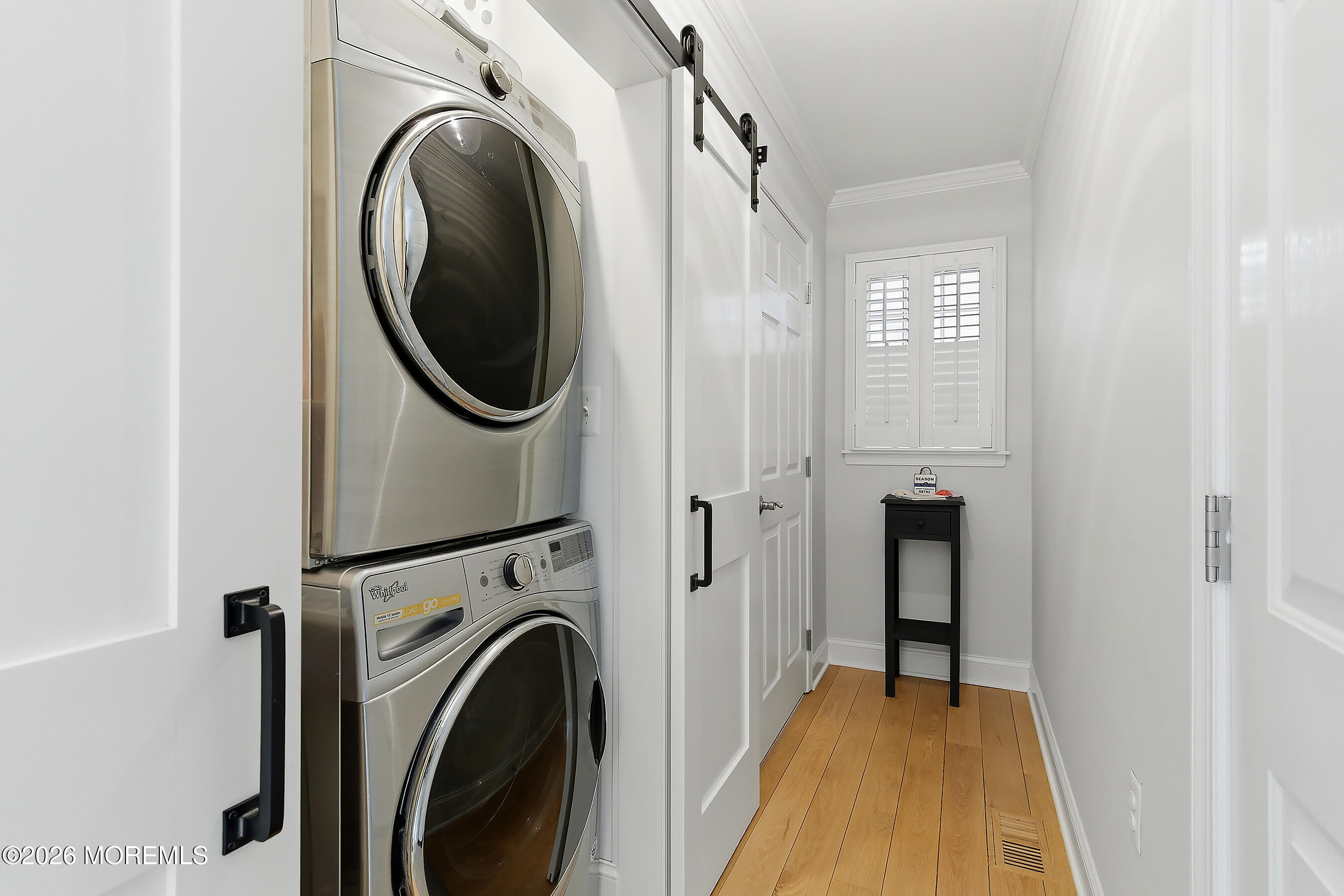 924 Ocean Road Point Pleasant, NJ 08742 - Photo 20 of 56 a view of a hallway with washer and dryer