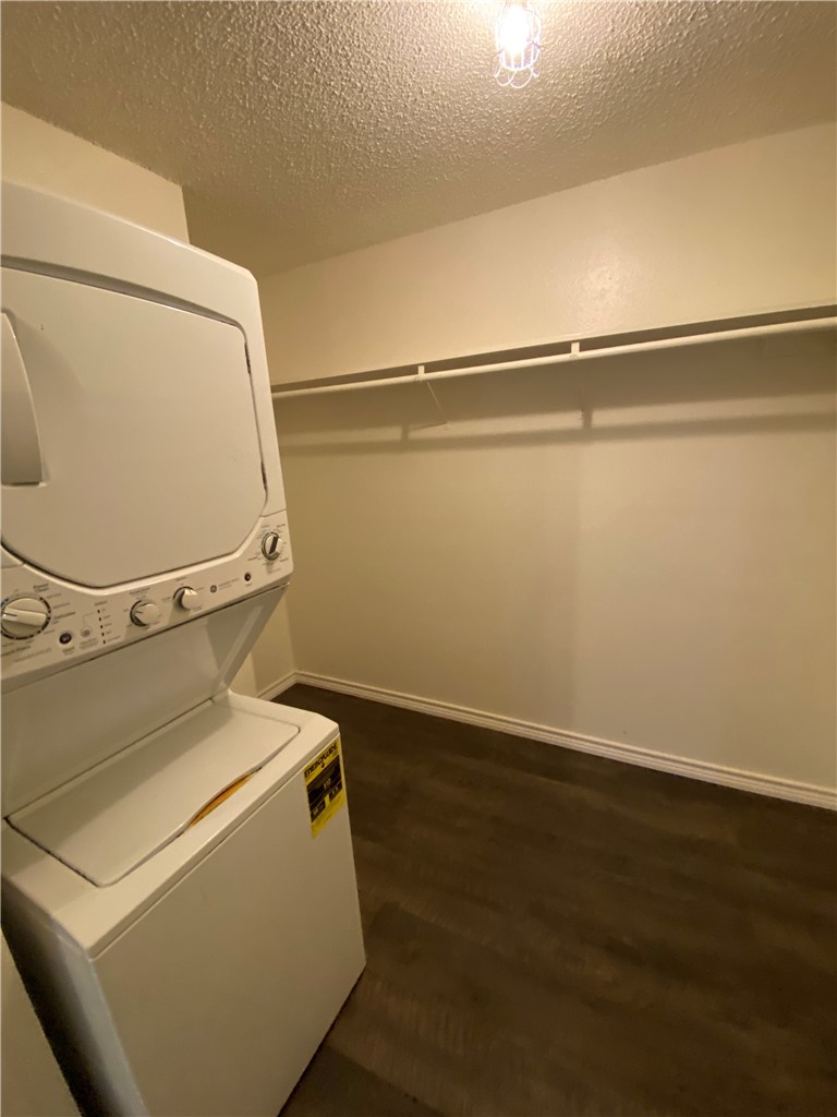 2401 Leon Street, Unit 206 Austin, TX 78705 - Photo 14 of 16 a utility room with dryer and washer