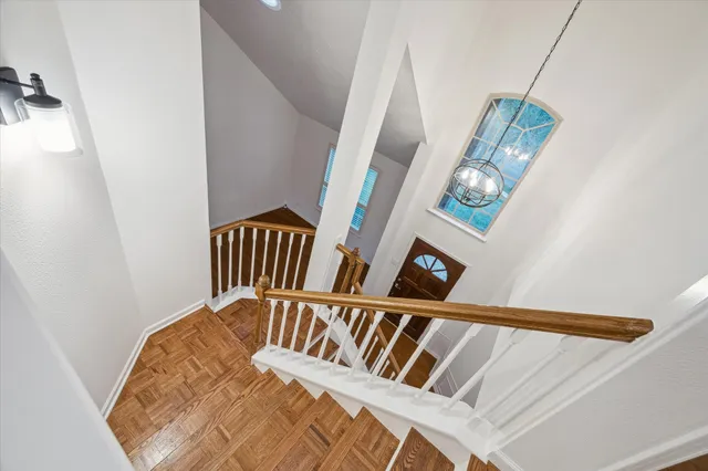 a balcony with wooden floor