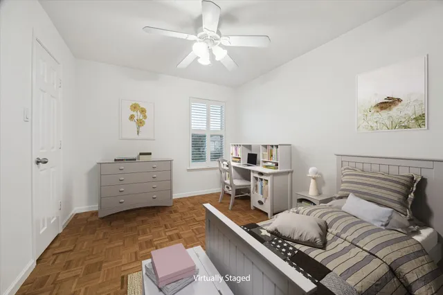 a bed room with a bed and a window