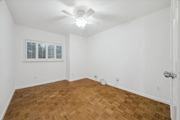 a view of empty room with windows