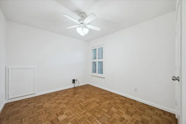 a view of a room with a fan
