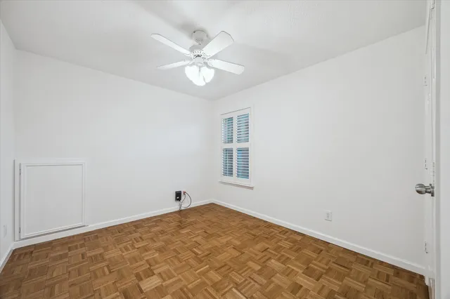 a view of a room with a fan