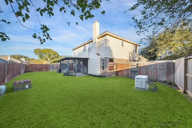a backyard of a house with seating space