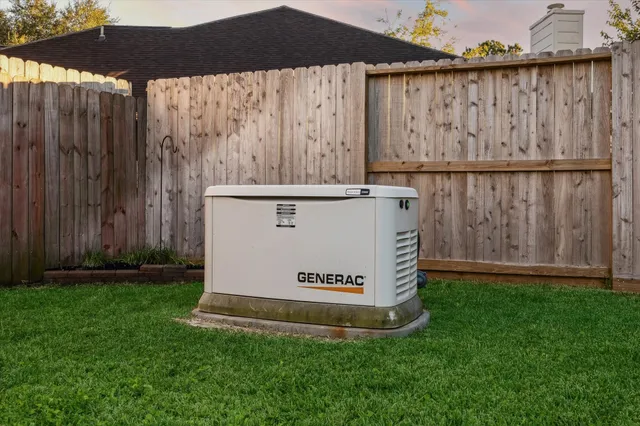 a view of outdoor space with deck and yard