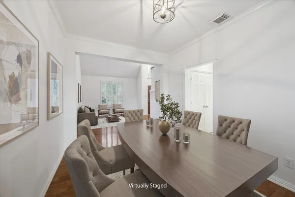 a view of a dining room with furniture