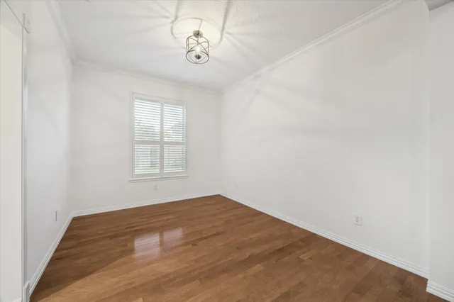 a view of empty room with windows