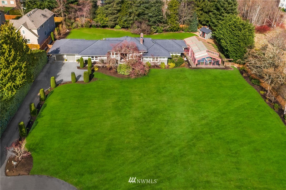21731 35th Avenue Southeast Bothell, WA 98021 - Photo 1 of 36 an aerial view of a house with a garden