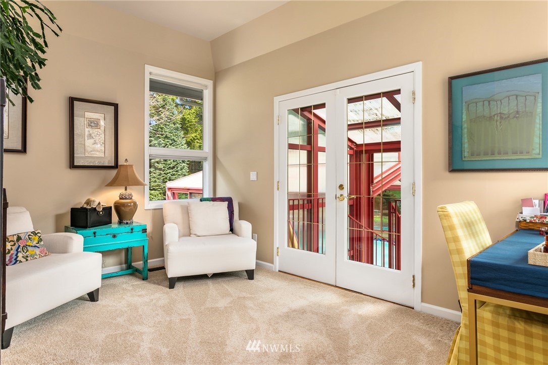 21731 35th Avenue Southeast Bothell, WA 98021 - Photo 17 of 36 a living room with furniture and a window with outer view