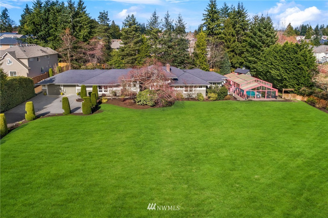 21731 35th Avenue Southeast Bothell, WA 98021 - Photo 3 of 36 a view of a house with a yard