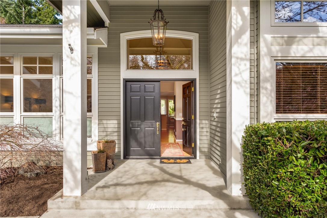 21731 35th Avenue Southeast Bothell, WA 98021 - Photo 26 of 36 a view of a brick house with potted plants