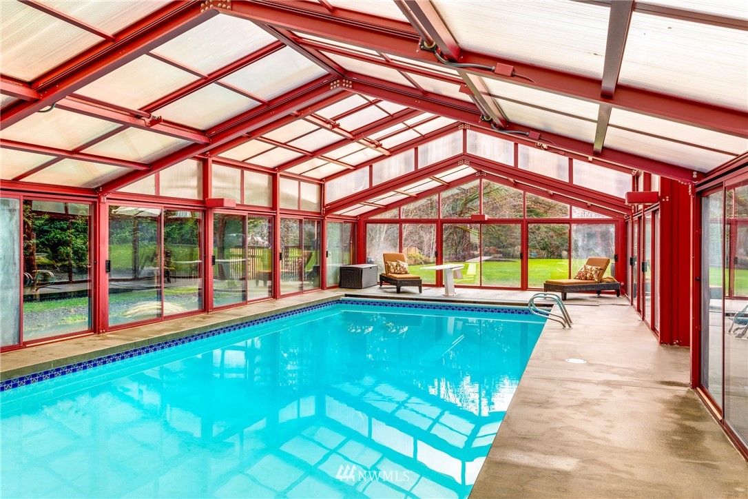 21731 35th Avenue Southeast Bothell, WA 98021 - Photo 27 of 36 a swimming pool with yard in front of it