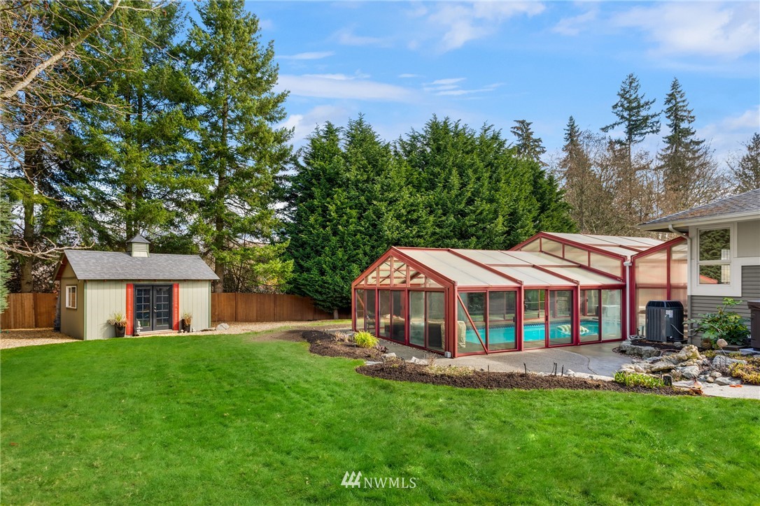 21731 35th Avenue Southeast Bothell, WA 98021 - Photo 36 of 36 a view of a house with a yard porch and sitting area