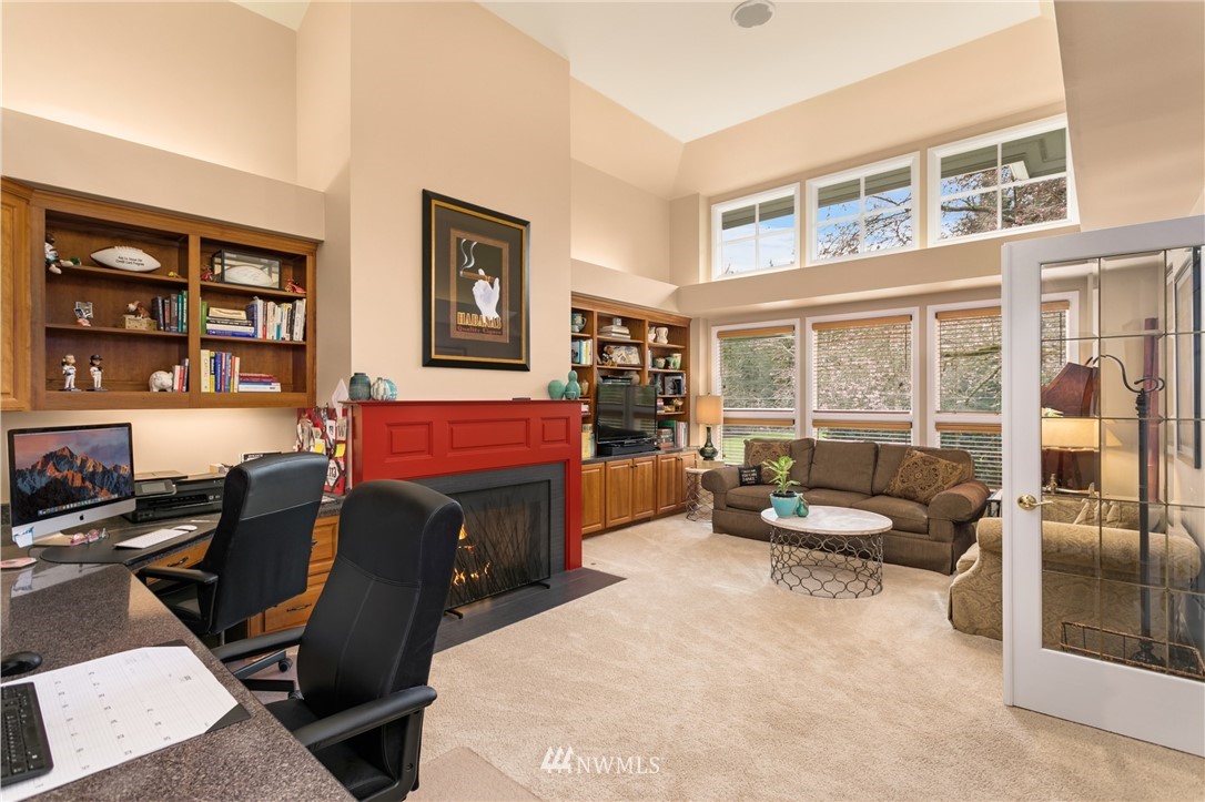 21731 35th Avenue Southeast Bothell, WA 98021 - Photo 6 of 36 a living room with furniture and a window