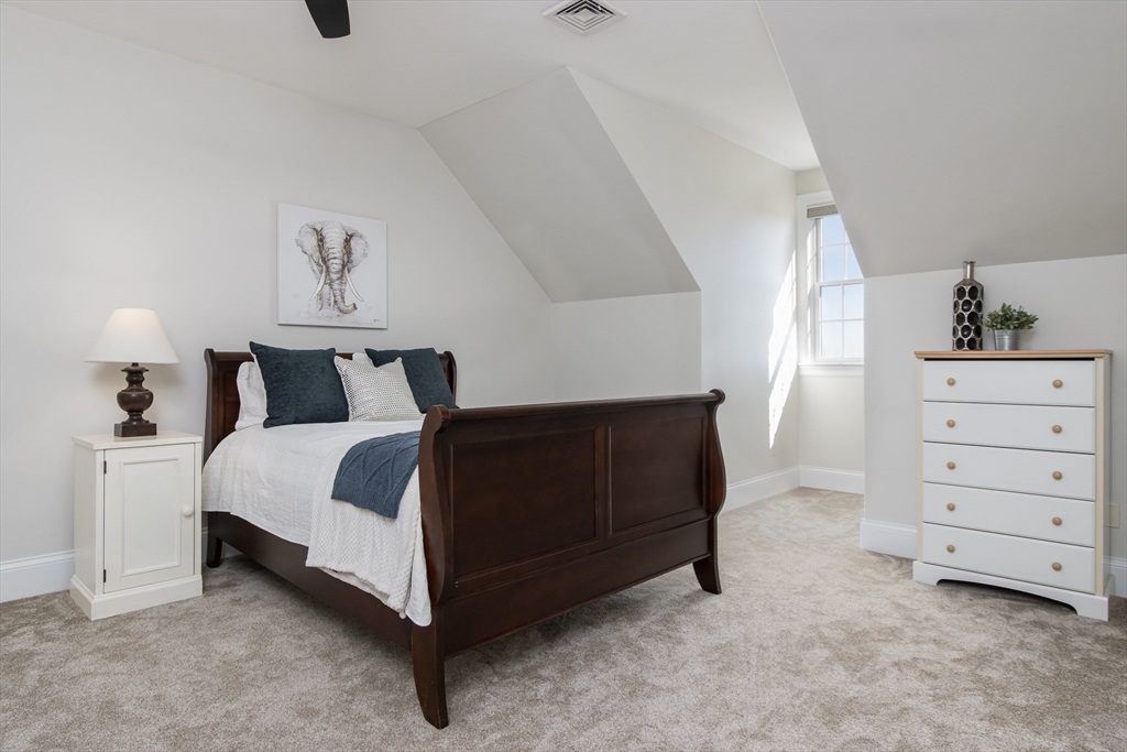 63 Skyfields Drive Groton, MA 01450 - Photo 21 of 40 a bedroom with a bed and a window