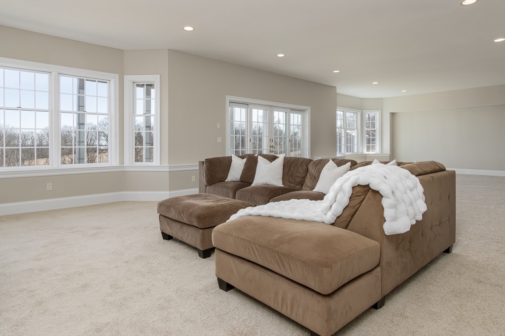 63 Skyfields Drive Groton, MA 01450 - Photo 24 of 40 a living room with furniture and windows