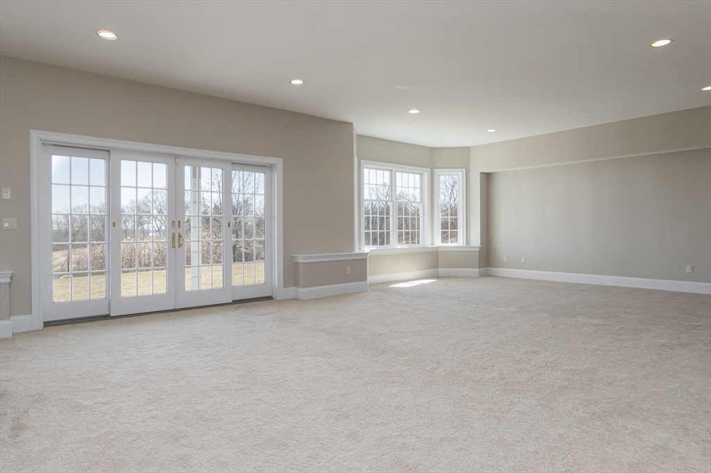 63 Skyfields Drive Groton, MA 01450 - Photo 25 of 40 a view of an empty room with a window