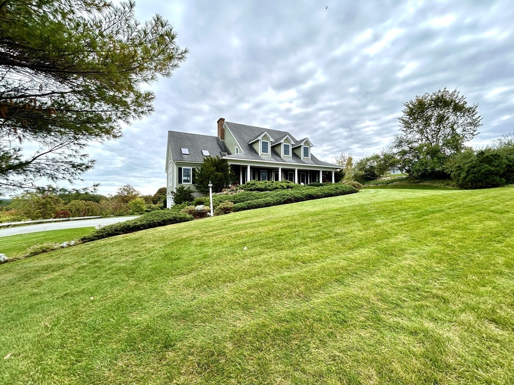 63 Skyfields Drive Groton, MA 01450 - Photo 26 of 40 a view of a house with a big yard