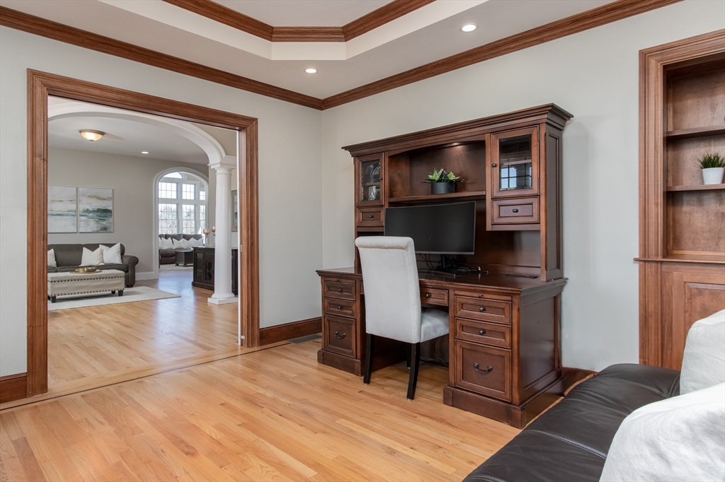 63 Skyfields Drive Groton, MA 01450 - Photo 3 of 40 a view of a livingroom with furniture and a flat screen tv