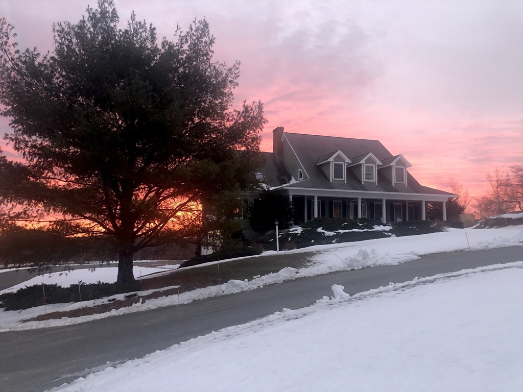 63 Skyfields Drive Groton, MA 01450 - Photo 35 of 40 a view of a house with a yard