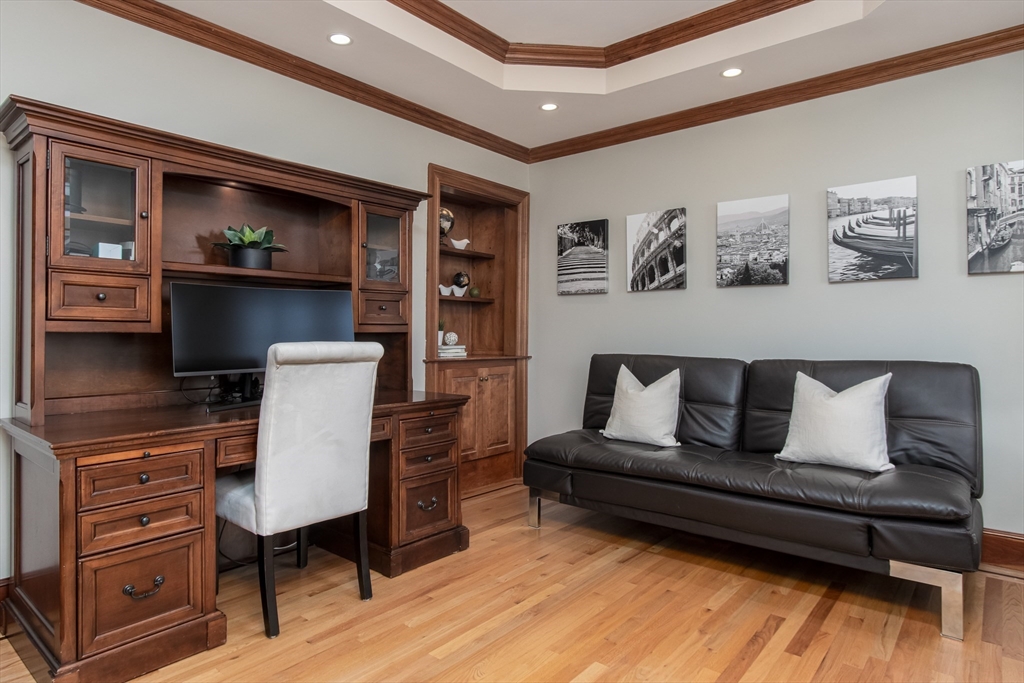 63 Skyfields Drive Groton, MA 01450 - Photo 4 of 40 a living room with furniture and wooden floor
