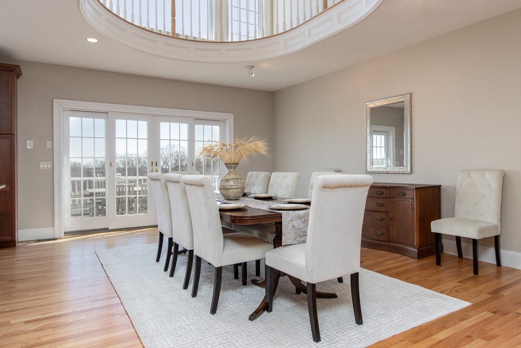 63 Skyfields Drive Groton, MA 01450 - Photo 7 of 40 a view of a dining room with furniture window and wooden floor