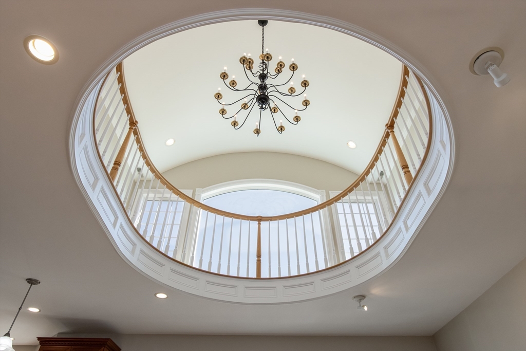 63 Skyfields Drive Groton, MA 01450 - Photo 9 of 40 a view of hall way with furniture