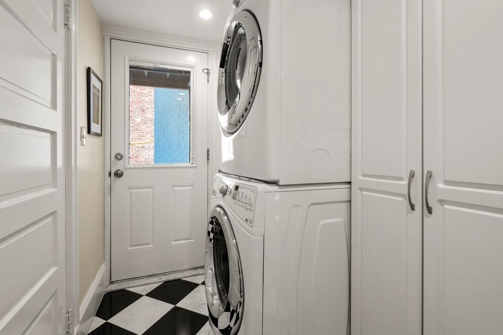 10 Kilsyth Road, Unit 2 Brookline, MA 02445 - Photo 16 of 21 a front view of a house with parking space