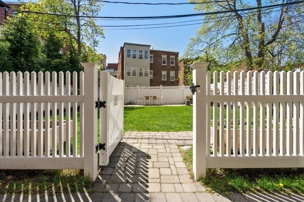 10 Kilsyth Road, Unit 2 Brookline, MA 02445 - Photo 17 of 21 a view of a house with a small yard