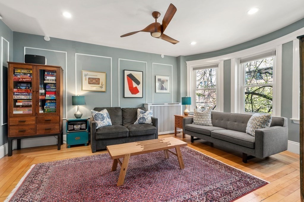 10 Kilsyth Road, Unit 2 Brookline, MA 02445 - Photo 2 of 21 a living room with furniture and a window