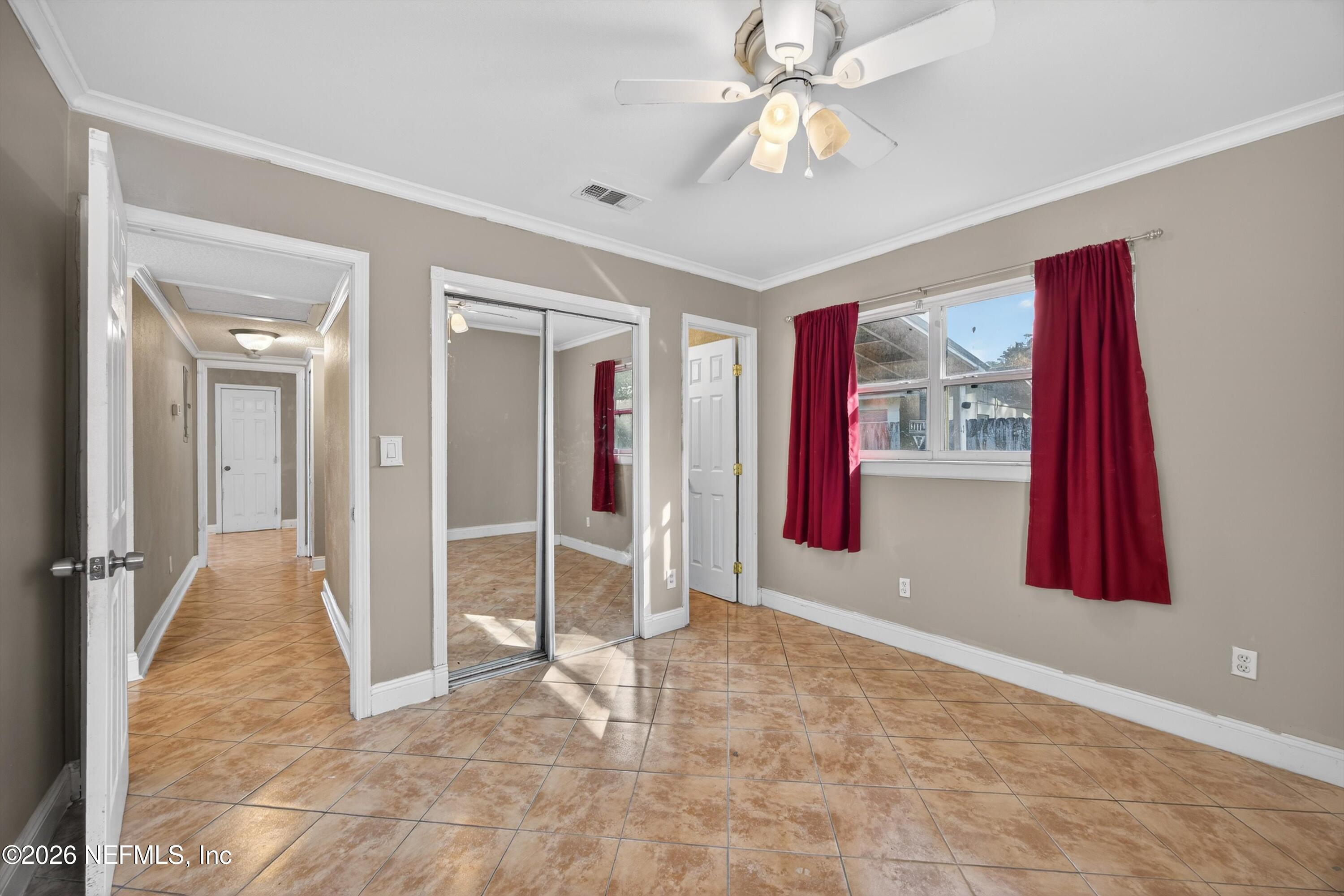 5134 Damascus Road South Jacksonville, FL 32207 - Photo 20 of 41 wooden floor and windows in a room