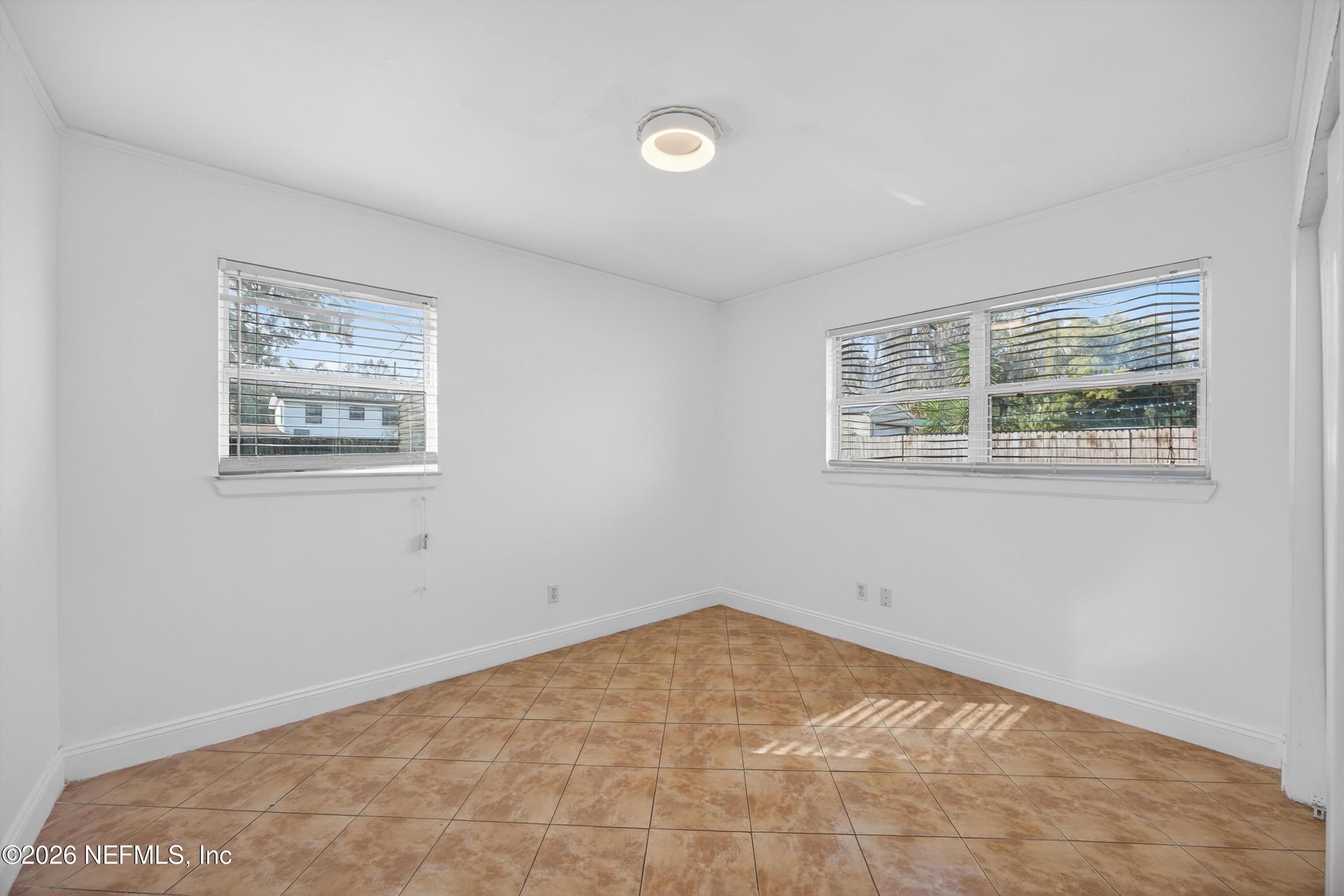 5134 Damascus Road South Jacksonville, FL 32207 - Photo 32 of 41 a view of empty room with windows