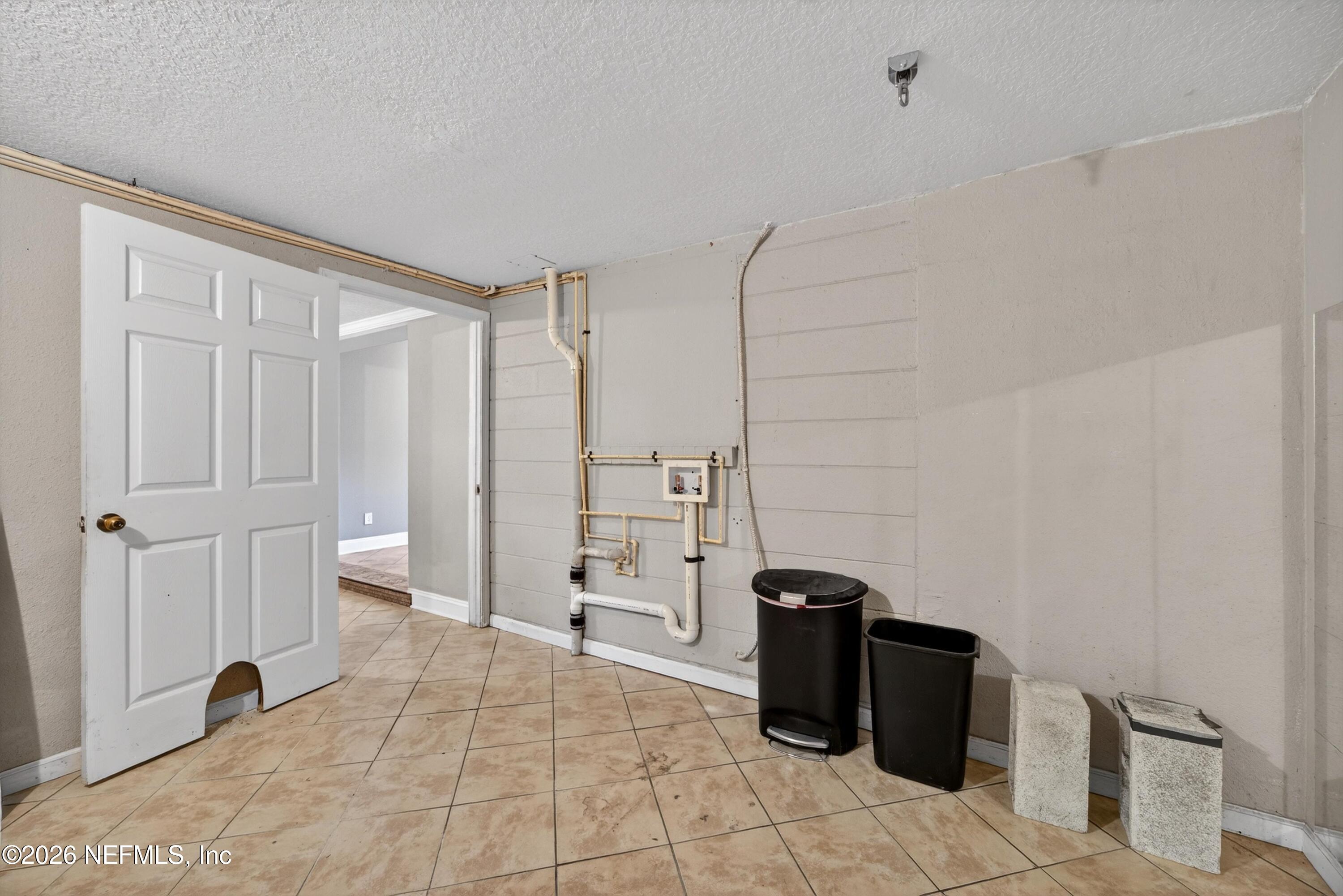 5134 Damascus Road South Jacksonville, FL 32207 - Photo 36 of 41 a view of a storage & utility room with a sink