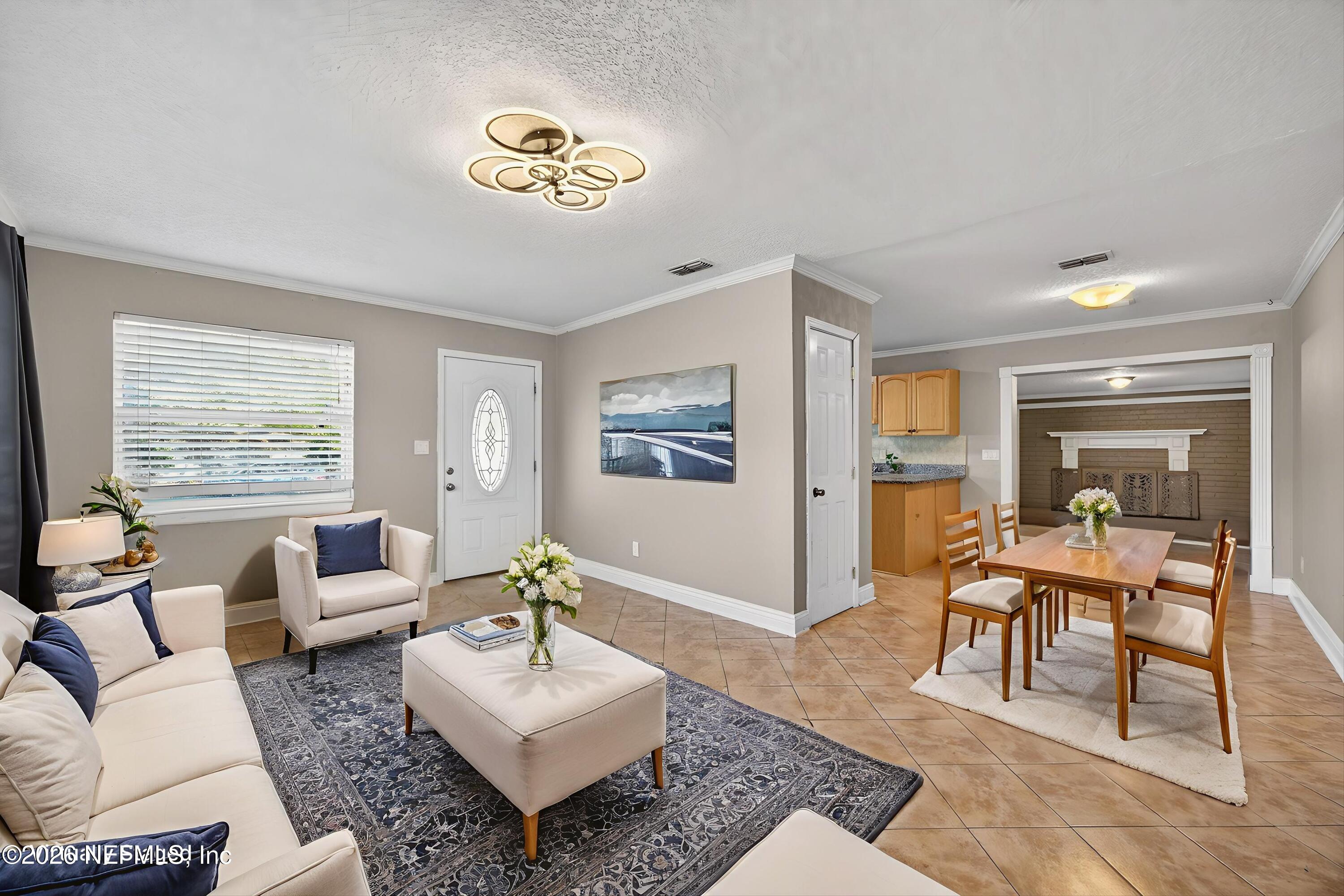 5134 Damascus Road South Jacksonville, FL 32207 - Photo 9 of 41 a living room with furniture and a window