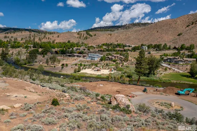 a view of a road with mountain view in back