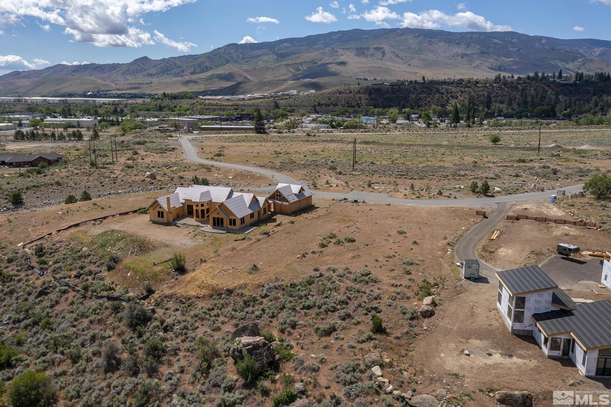 421 River Pines Drive, Unit 2 Verdi, NV 89439 - Photo 21 of 22 a view of a lake with a mountain