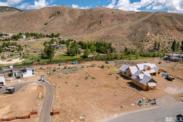 a view of a backyard of a house