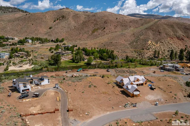 an aerial view of a town with couple of houses