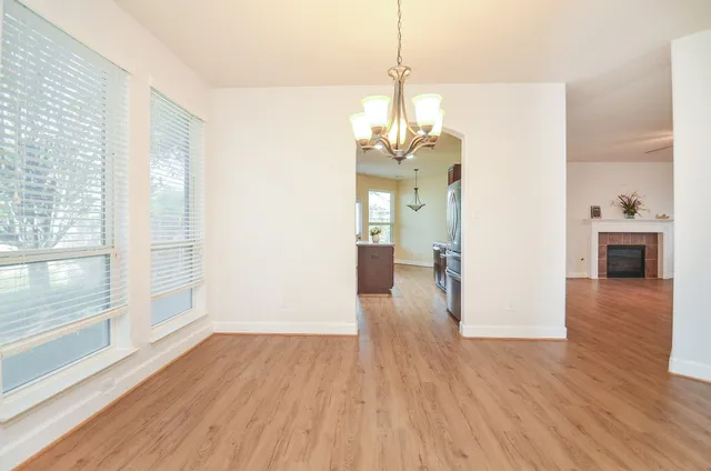 a view of a livingroom with wooden floor