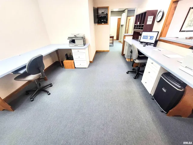 a view of a hallway with a white walls